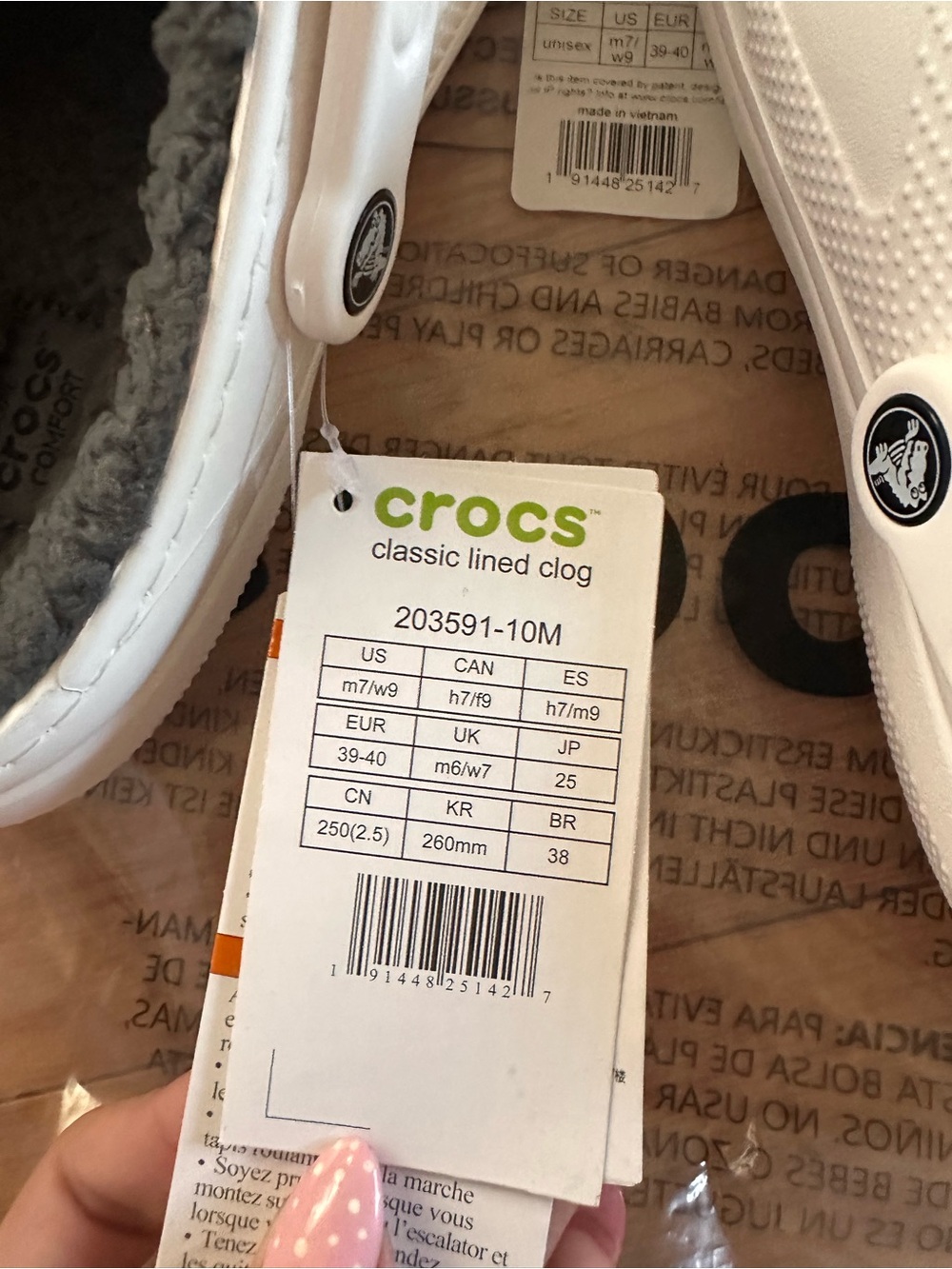 Crocs Classic Clogs in White and Black - Picture 5 of 6